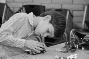 I don't entertain my kids - boy building model car