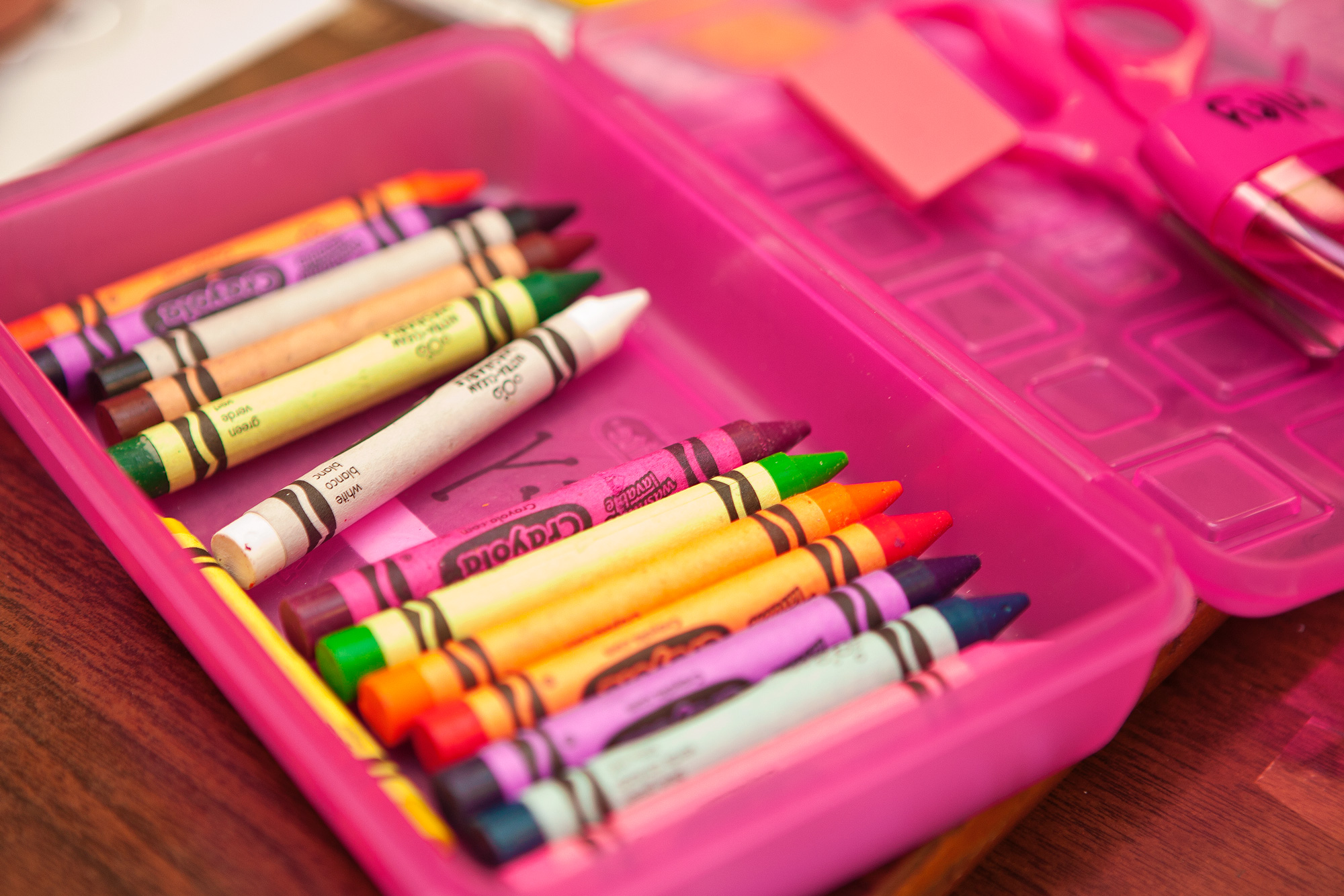 The last year of elementary school - supply box with crayons