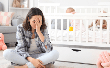 young mom with postpartum depression